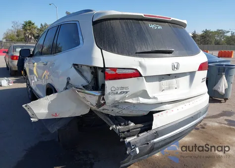 2018 Honda Pilot Touring z USA, uszkodzony, nr VIN 5FNYF6H98JB037825